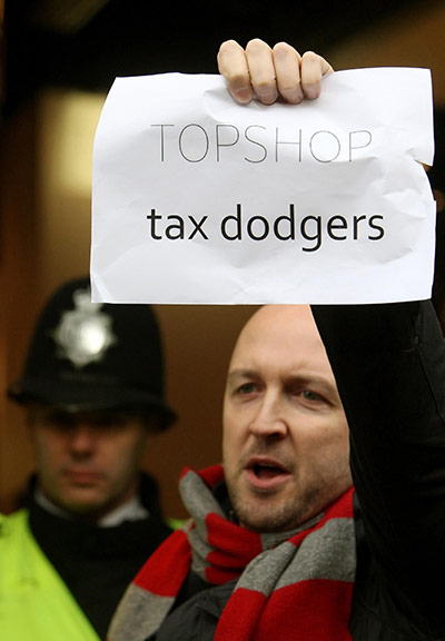 UK Uncut: Demonstrators from UK Uncut outside Topshop, on Oxford Street, London