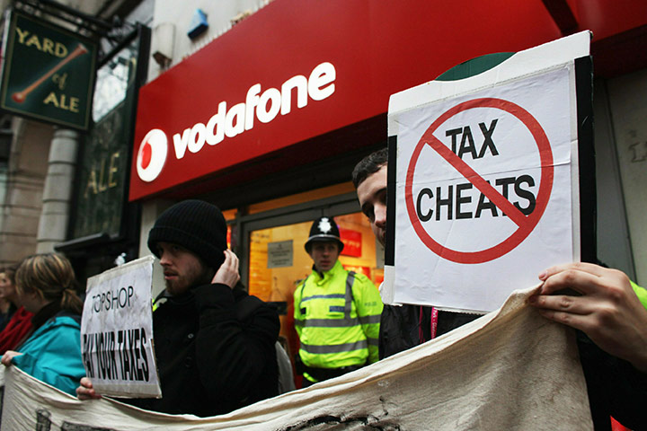 UK Uncut: Protesters campaign outside Vodafone during a demonstration in Birmingham