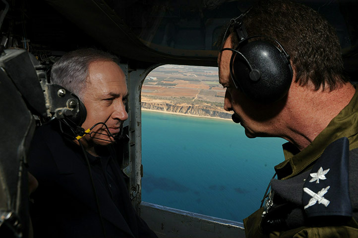 Israel forest fire: Israel's Prime Minister Binyamin Netanyahu flies over Carmel Mountain fire