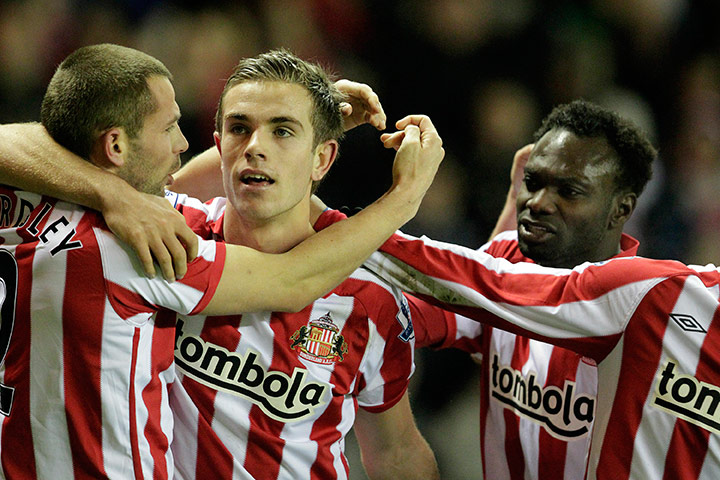 sport: Sunderland's Jordan Henderson (C) celebr