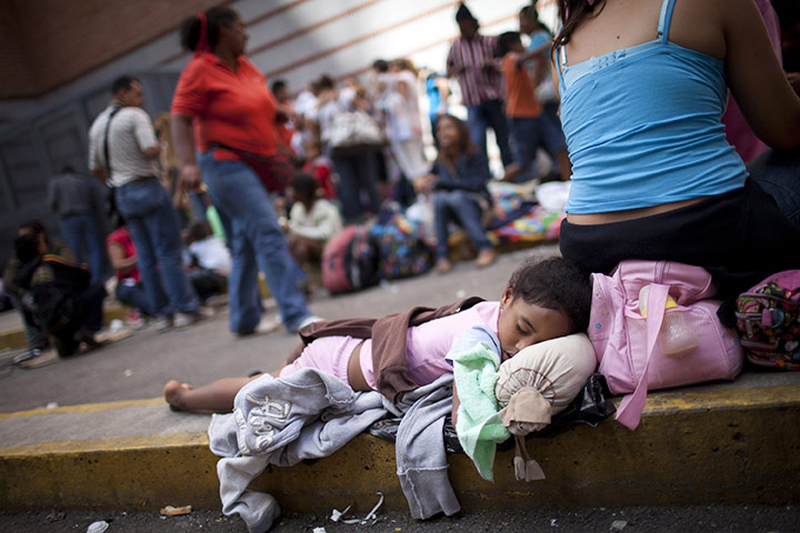 24 hours: flood victimsin  Caracas