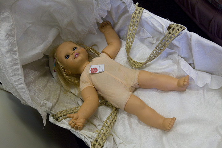 Spending review: A doll in a second-hand furniture store run by the Salvation Army 