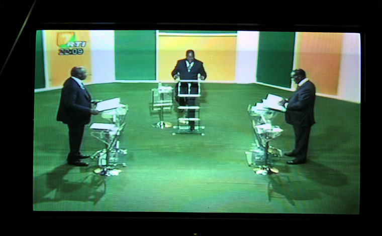 Ivory Coast: Photo taken on TV screen shows Ivorian presidential candidates