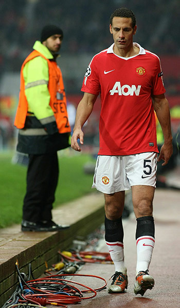 Champions League Tuesday: Rio Ferdinand leaves the pitch after picking up an injury