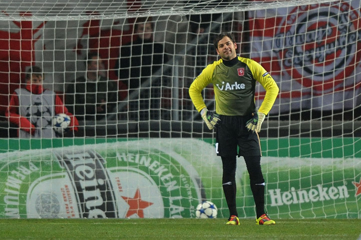 Champions League Tuesday: Sander Boschker is dejected after his error gives Tottenham the lead