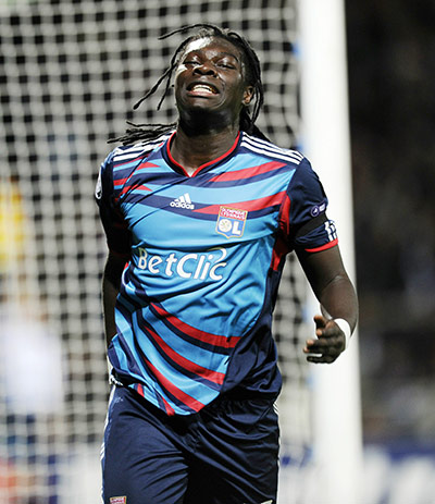 Tuesday Champions League: Lyon's French forward Bafetimbi Gomis reacts after missing a chance