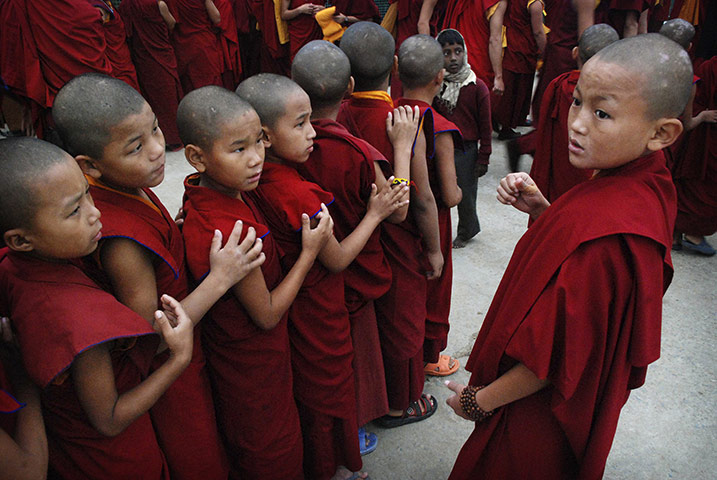 24 hours: Bodh Gaya, India: Young Tibetan Buddhist monks commemorate First Karmapa