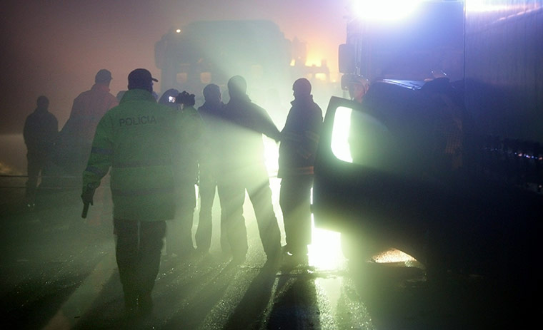 24 hours: Bratislava, Slovakia: Police officers at a car crash 