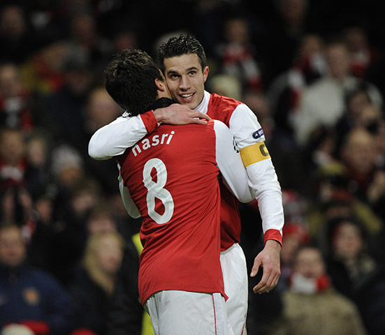 Arsenal v Partizan: Nasri gives Van Persie a hug as they celebrate the stand-in captain's goal