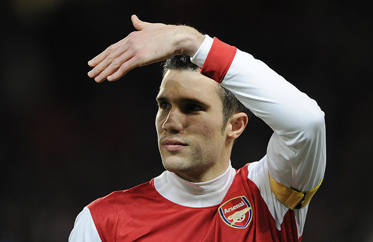 Arsenal Champions League: Stand-in captain Robin Van Persie keeps an eye on proceedings