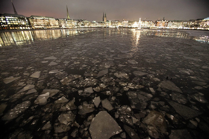 Cold weather abroad: Hamburg, Germany: Ice floats on the surface of the Binnenalster