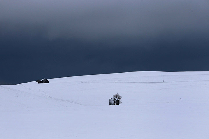 Cold weather abroad: Wald, Germany: The landscape is covered in snow 