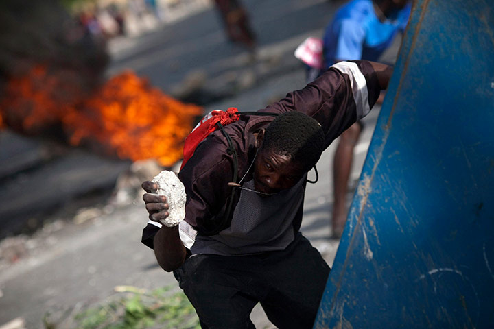 24 hours in pictures: A supporter of Haitian presidential candidate Michel Martelly, Haiti