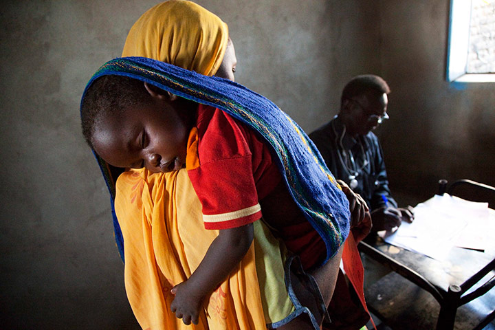 24 hours in pictures: Resident of Kalma camp, for internally displaced persons