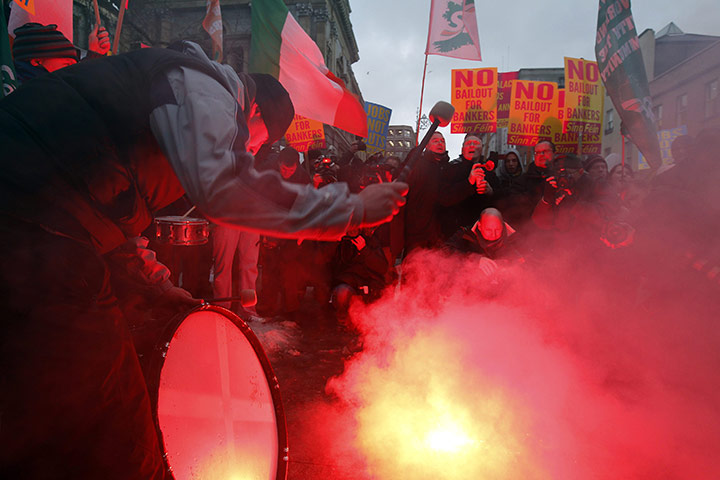 Business week in pictures: Demonstrators protest outside Government Buildings over the budget
