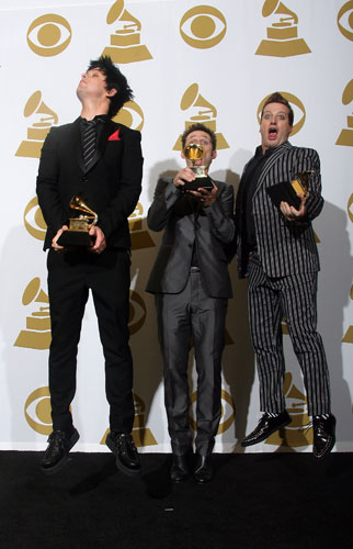 grammys: Green Day pose with their awards 