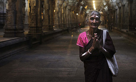 A-Tamil-woman-prays-at-a--001.jpg