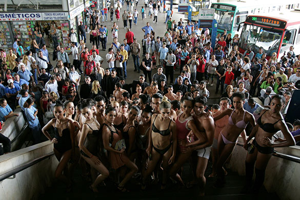 24 hours: Models pose at a bus station during National Underwear Day in Brazil