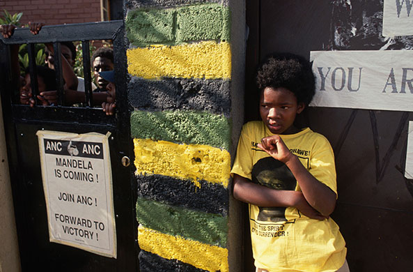Mandela prison release: 12 February 1990: A young boy waits outside Nelson Mandela's house