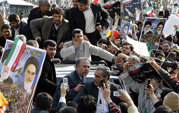 Iran 31st anniversary: Mahmoud Ahmadinejad car drives through the crowd in Azadi (Freedom) Square