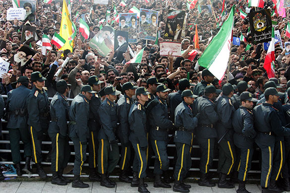 Iran 31st anniversary: Iranian security forces stand guard in Azadi (Freedom) Square