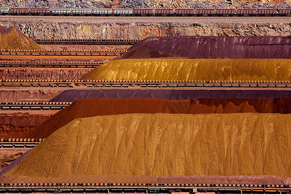 Week in Business: Iron ore piles at Rio Tinto's Parker Point, Dampier, Western Australia