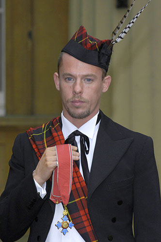 Alexander McQueen: 2003: Alexander Mcqueen With His CBE Investitures At Buckingham Palace