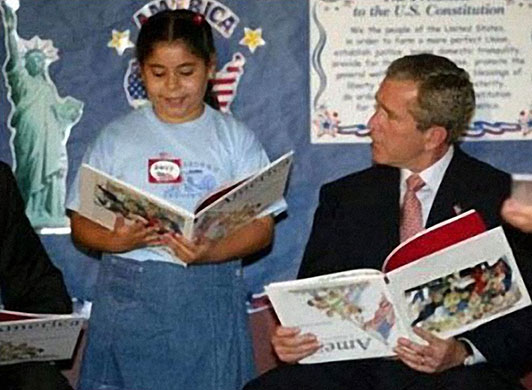 Photoshop at 20: George Bush reads a book upside down