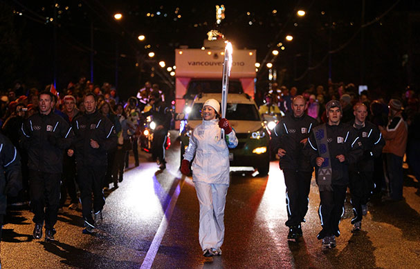 Winter Olympics Day -1 : Canadian singer Sarah McLachlan carries the Olympic flame
