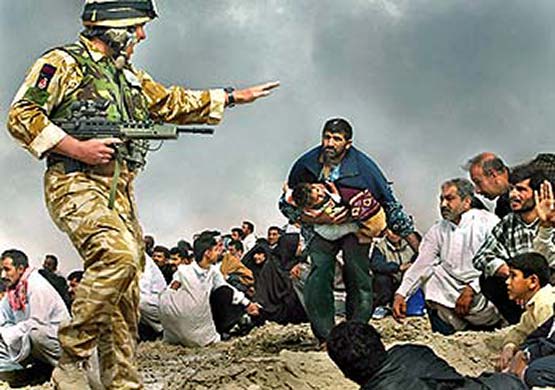 Photoshop at 20: Photoshop image of British soldier directing civilians from Iraqi fire