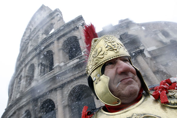 snow in Rome: A man dressed as an ancient Roman 