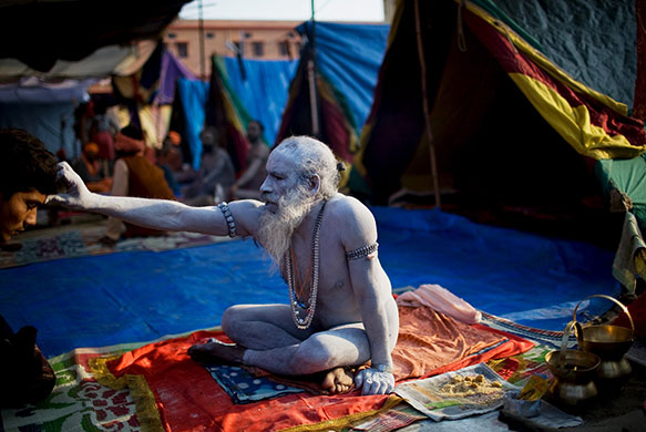 24 hours in pictures: Hindu Devotees Gather For Kumbh Mela