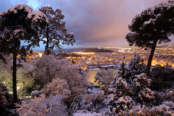 24 hours in pictures: Nice, France: Snow at dusk from a hill overlooking the French Riviera