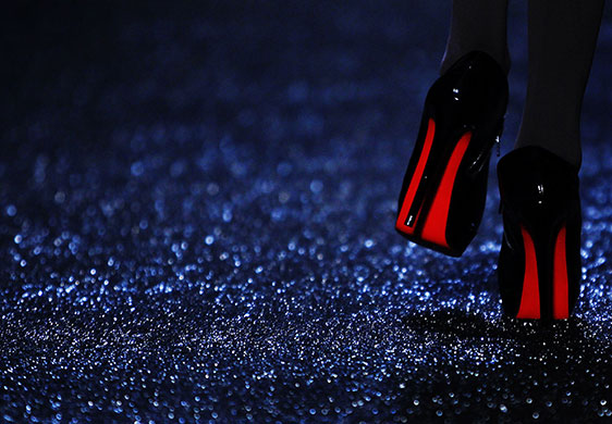 24 hours in pictures:  model's shoes are seen as she walks during Mackage Fall 2010 collection