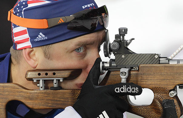 Winter Olympics Day 2: US Biathlete Jeremy Teela aims his rifle during a training session