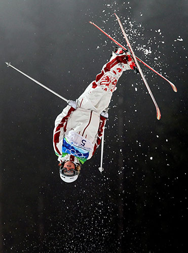 Winter Olympics day two: Kristi Richards of Canada in the women's freestyle skiing moguls final