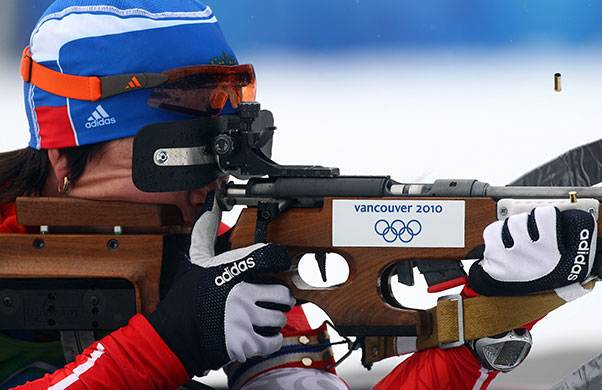 Winter Olympics day two: Olga Medvedtseva of Russia shoots in the Women's Biathlon 7.5 km Sprint 