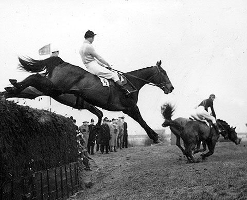 Dick Francis: 1956: Dick Francis jumping Devon Loch