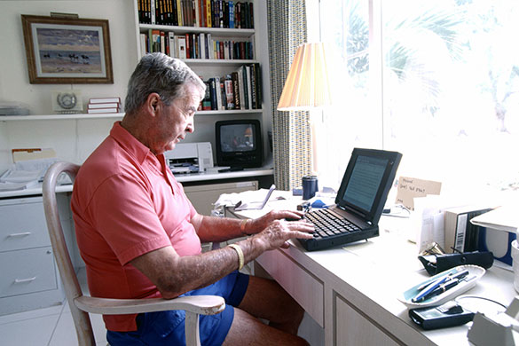 Dick Francis: 1998: Dick Francis writing at his home in Grand Cayman