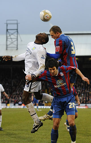 Football: Palace v Villa: Emile Heskey, left, competes with Clint Hill and Danny Butterfield