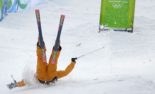 winter olympics day 3: Anthony Benna of France falls during moguls qualifications