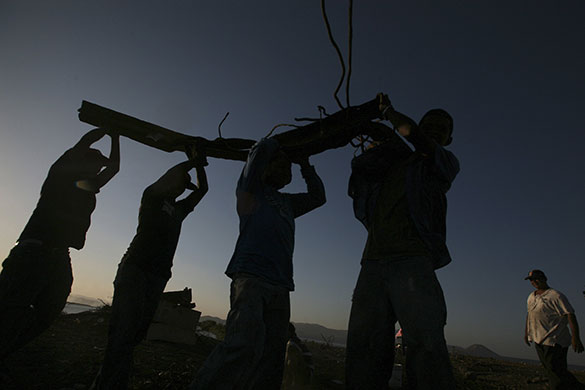 24 hours in pictures: People carry scrap iron in nicaragua