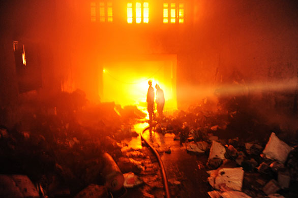 24 hours in pictures: fire in Ahmedabad, India