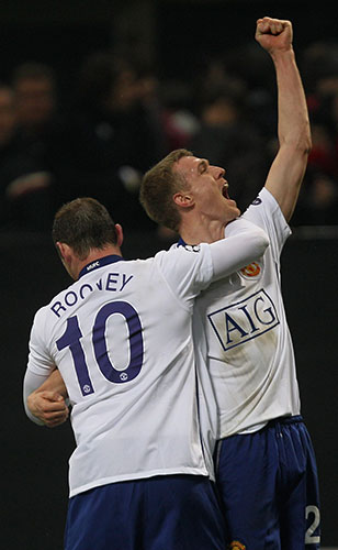 Tuesday Champions League: Wayne Rooney celebrates his second and Utd's third with Darren Fletcher