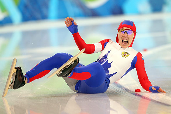 Winter Olympics day 5: Yulia Nemaya of Russia falls during the women's speed skating 500m