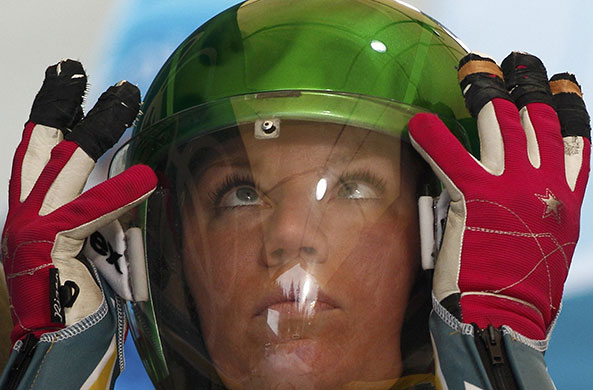 Winter Olympics day 5: Australia's Hannah Campbell-Pegg adjusts the visor in the women's luge