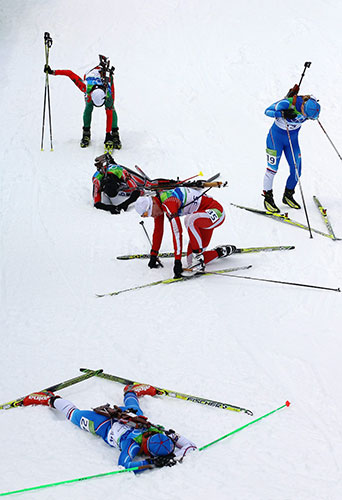 Winter Olympics day 5: Competitors look exhausted in the women's biathlon 10km pursuit