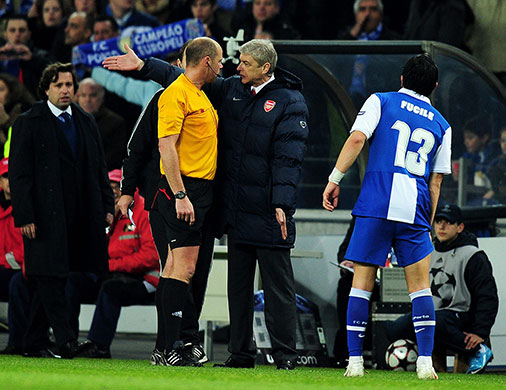 Wed Champions League: Arsene Wenger remonstrates with referee Martin Hansson about the decision