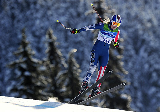 Winter Olympics day 6: Lindsey Vonn flies over the lip of a jump 