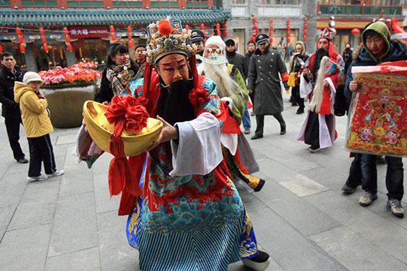 Week in business: The 'God of Prosperity' blesses businesses in Beijing